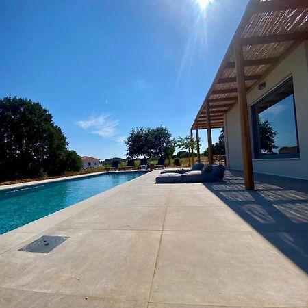 Alberi - Izla Homes Skala  Bagian luar foto